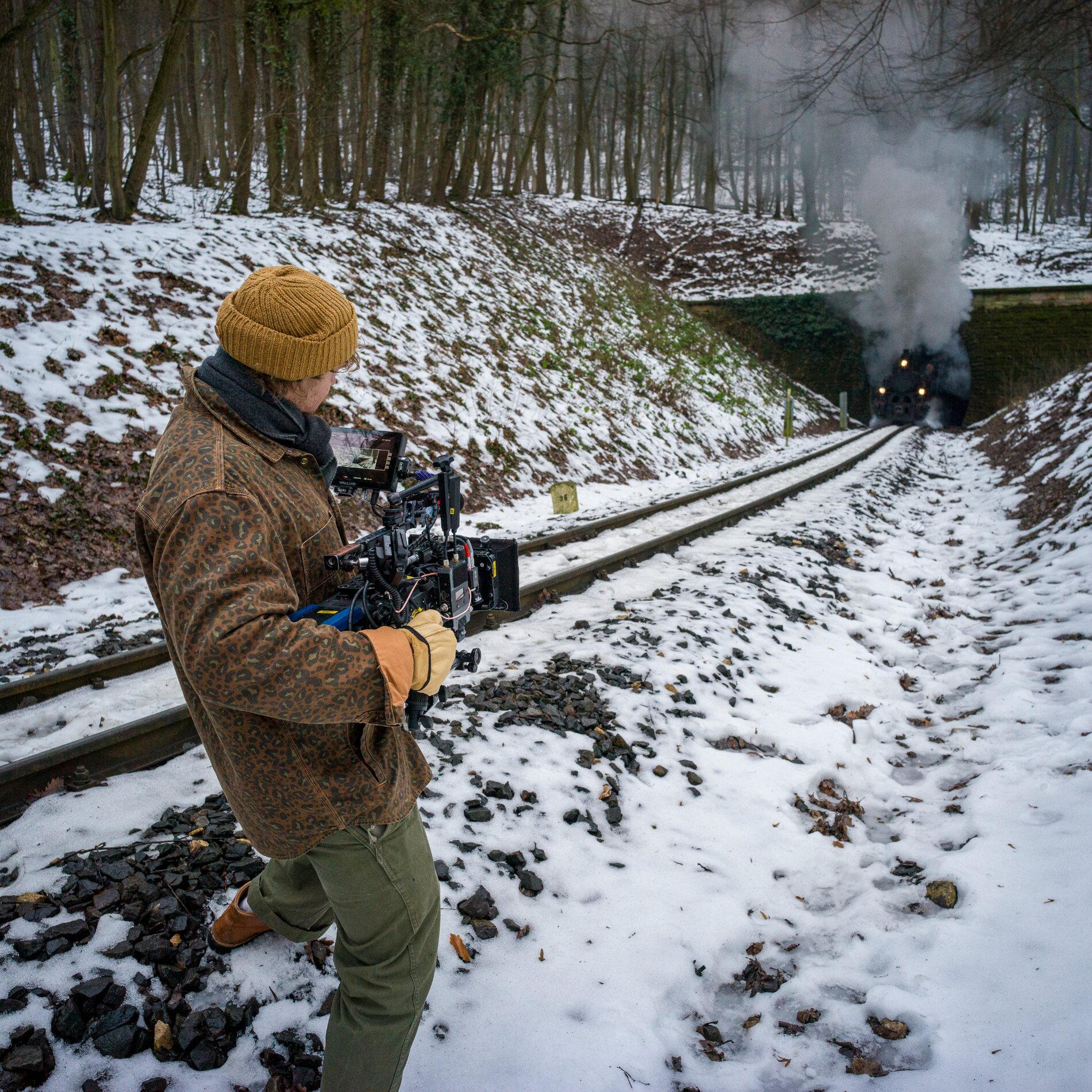 Admiral Film crew filming a steam train in winter